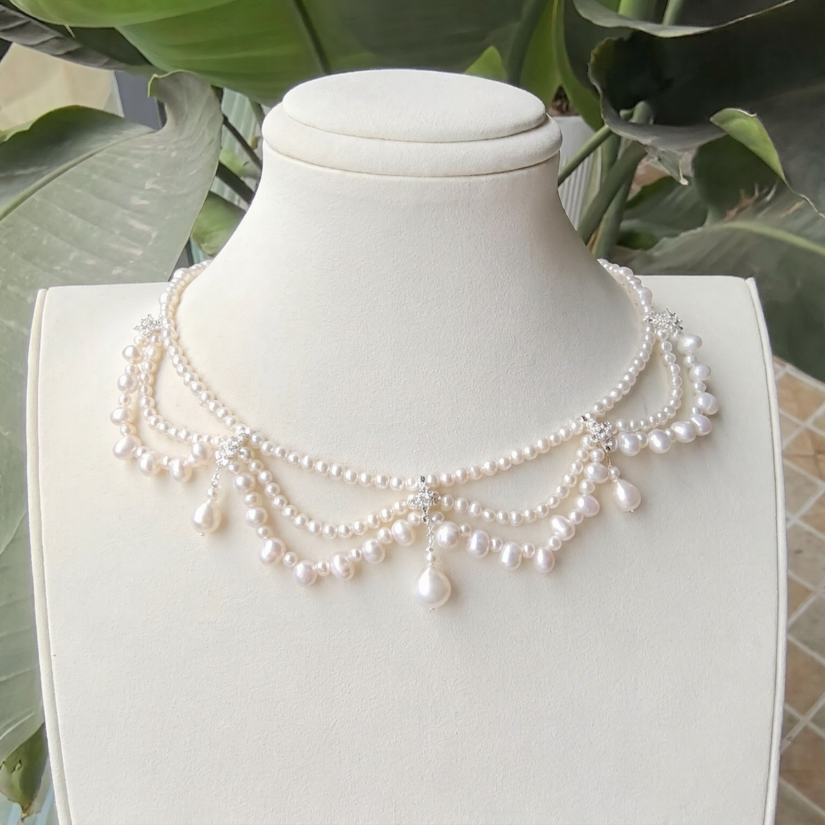 Front view of Celeste Layered Pearl Necklace, a natural freshwater pearl necklace for wedding guest looks