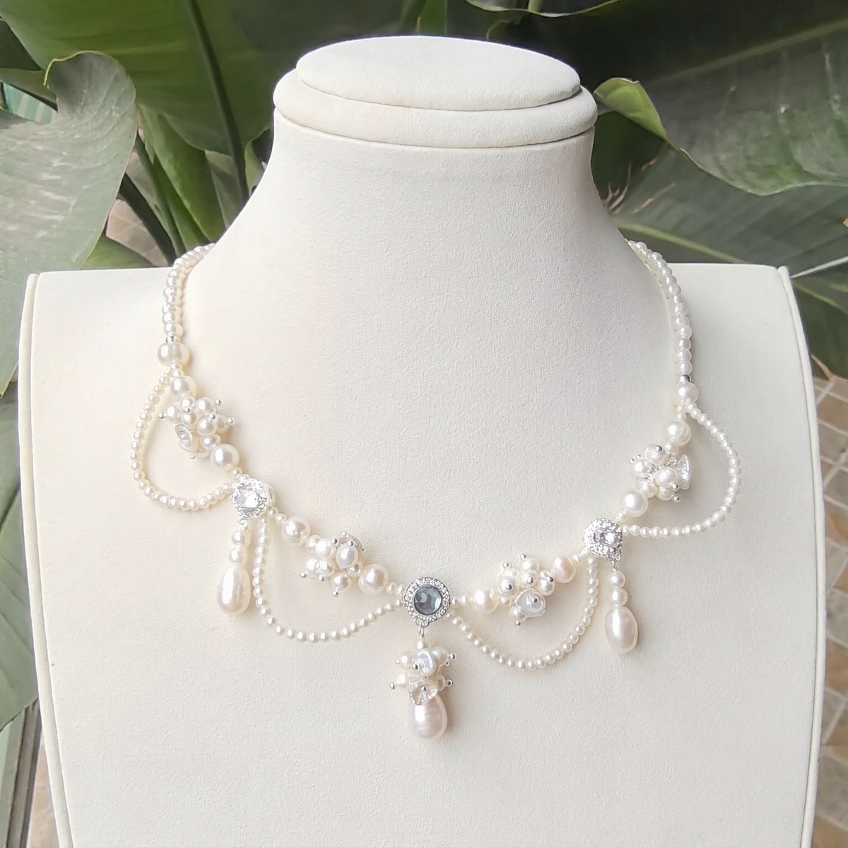 Front view of Dewdrop Layered Pearl Necklace, a natural freshwater pearl necklace for evening events