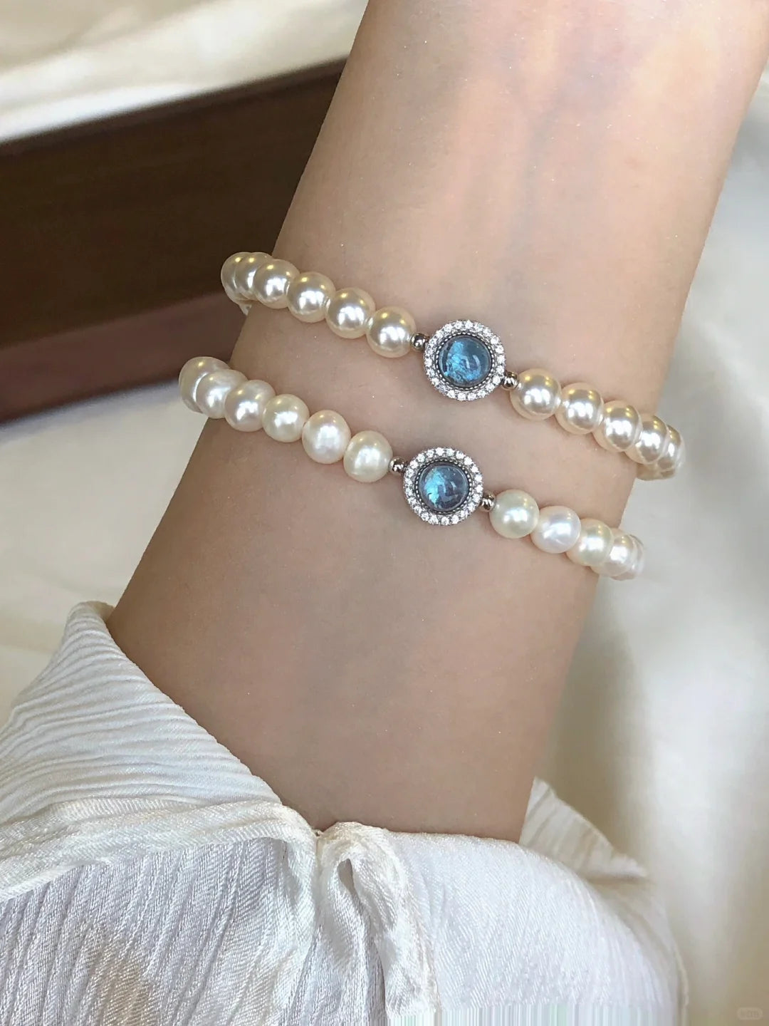 Styled view of double-strand high-lustre freshwater pearl bracelet for bridal styling