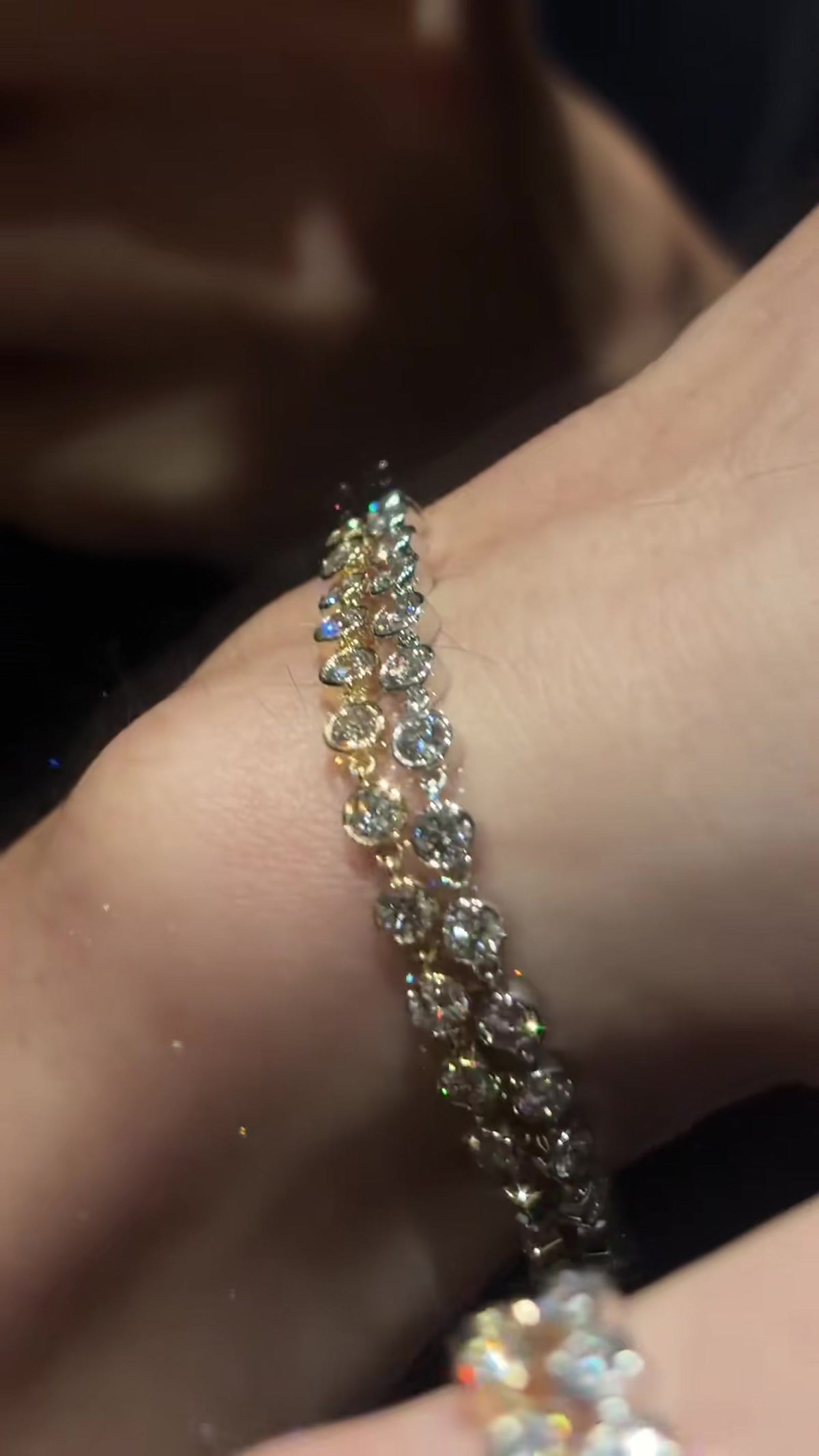 Close-up of lab-grown diamond bubble tennis bracelet for wedding guest outfits