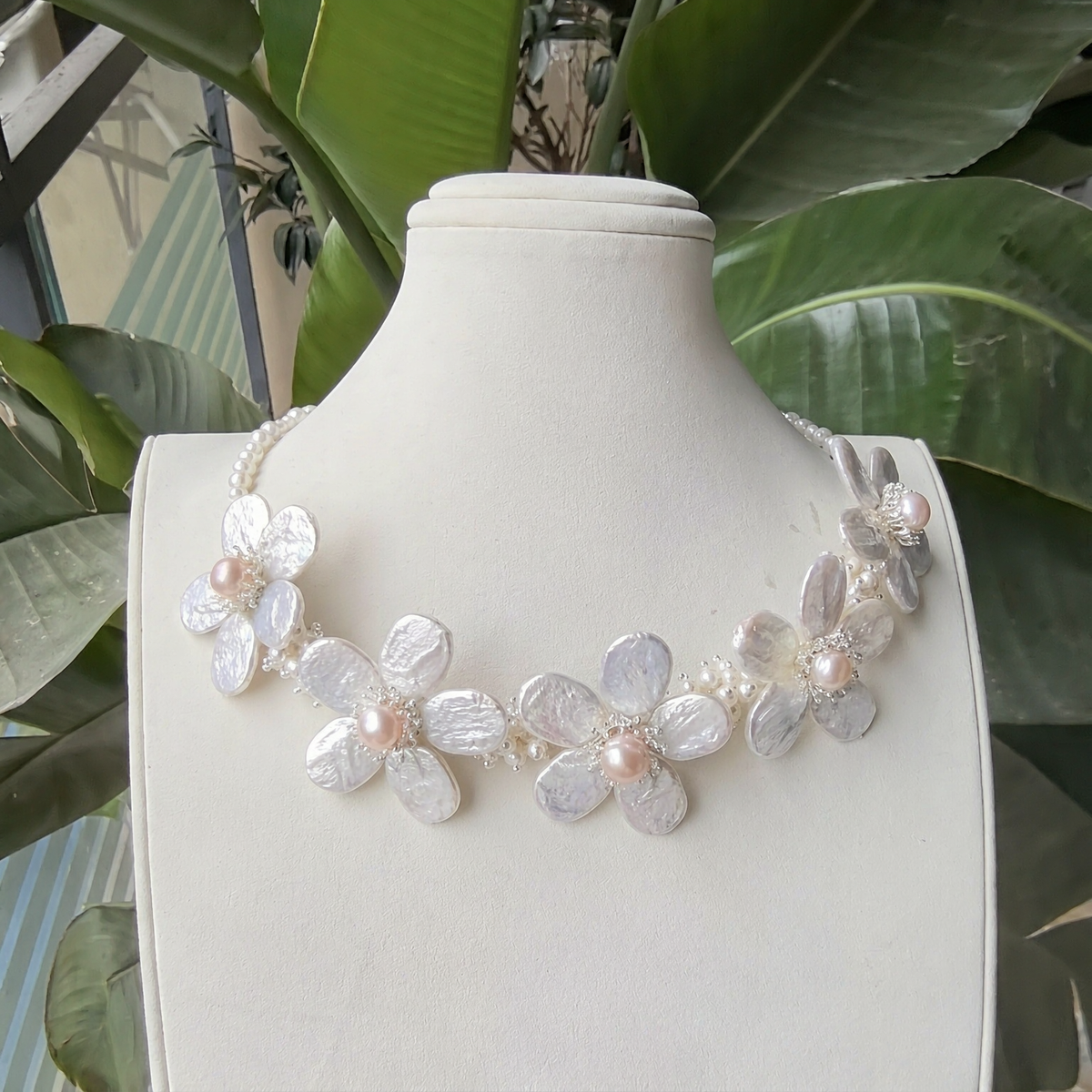Front view of Magnolia Baroque Pearl Statement Necklace, a natural freshwater baroque pearl necklace for black-tie events