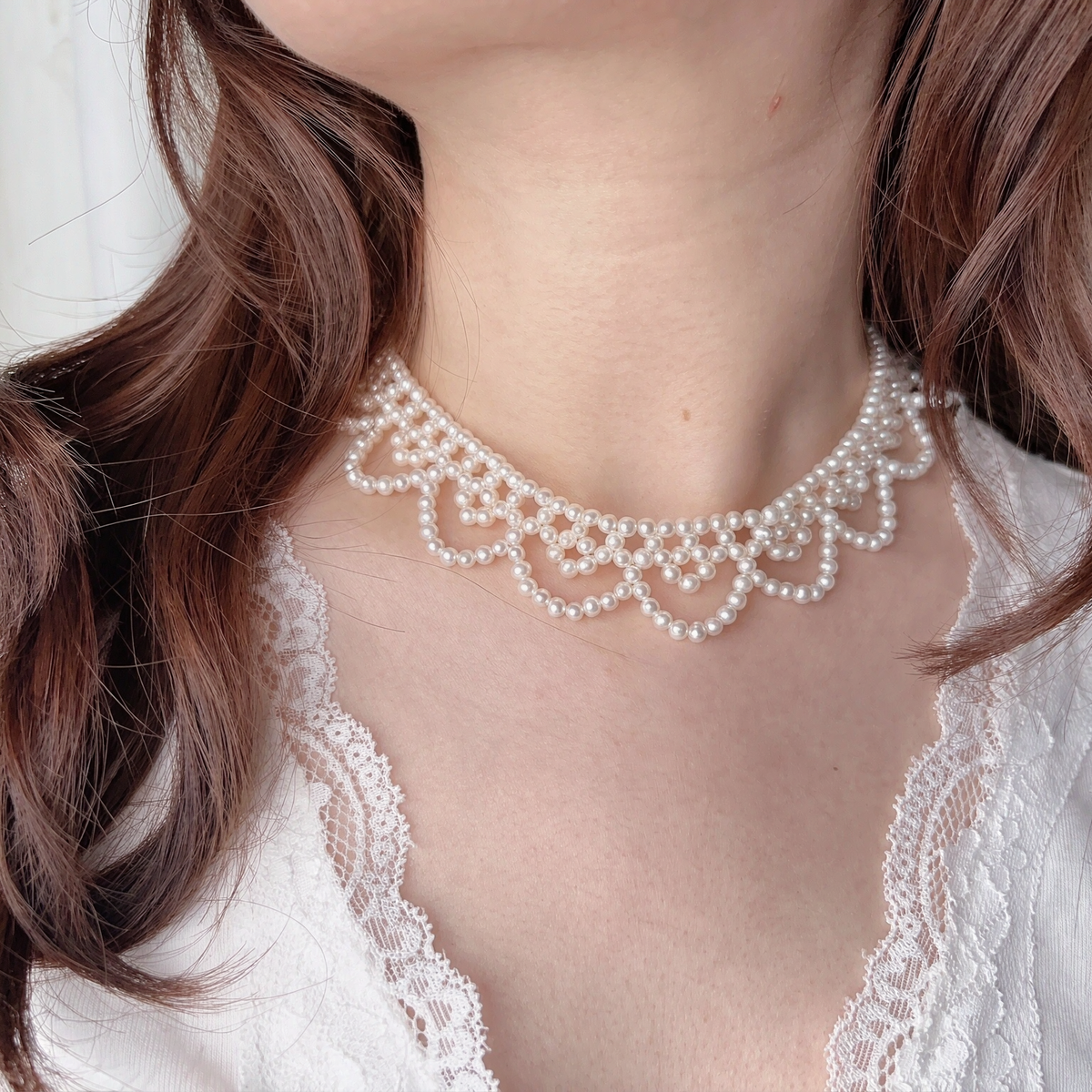 Front view of Scalloped Pearl Lace Choker, a natural freshwater pearl necklace for vintage-inspired bridal looks