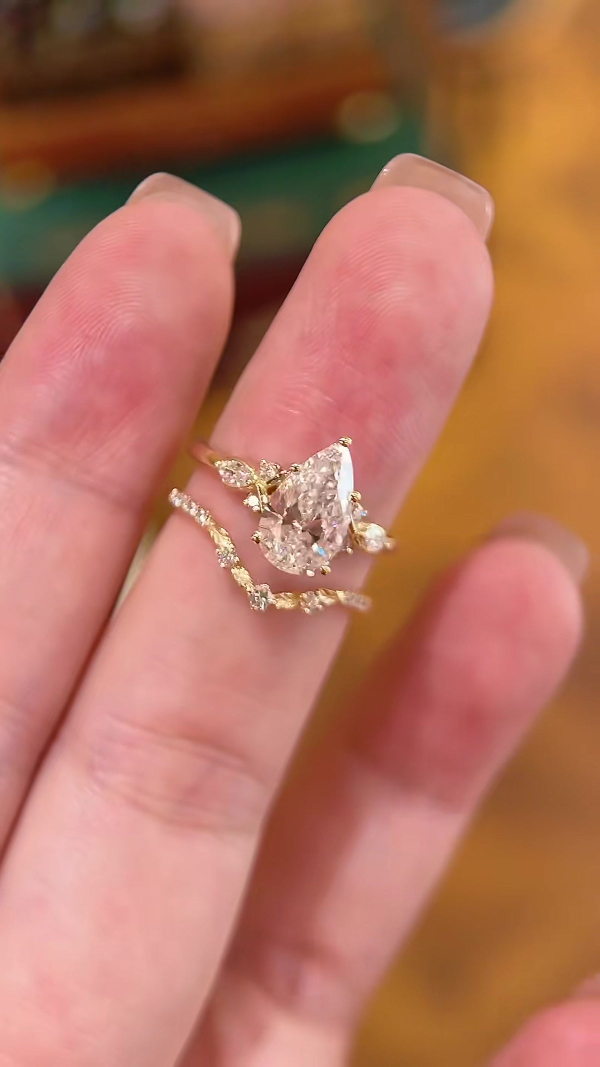 Close-up of lab-grown diamond pear bridal stacking ring for bridal ring stacks