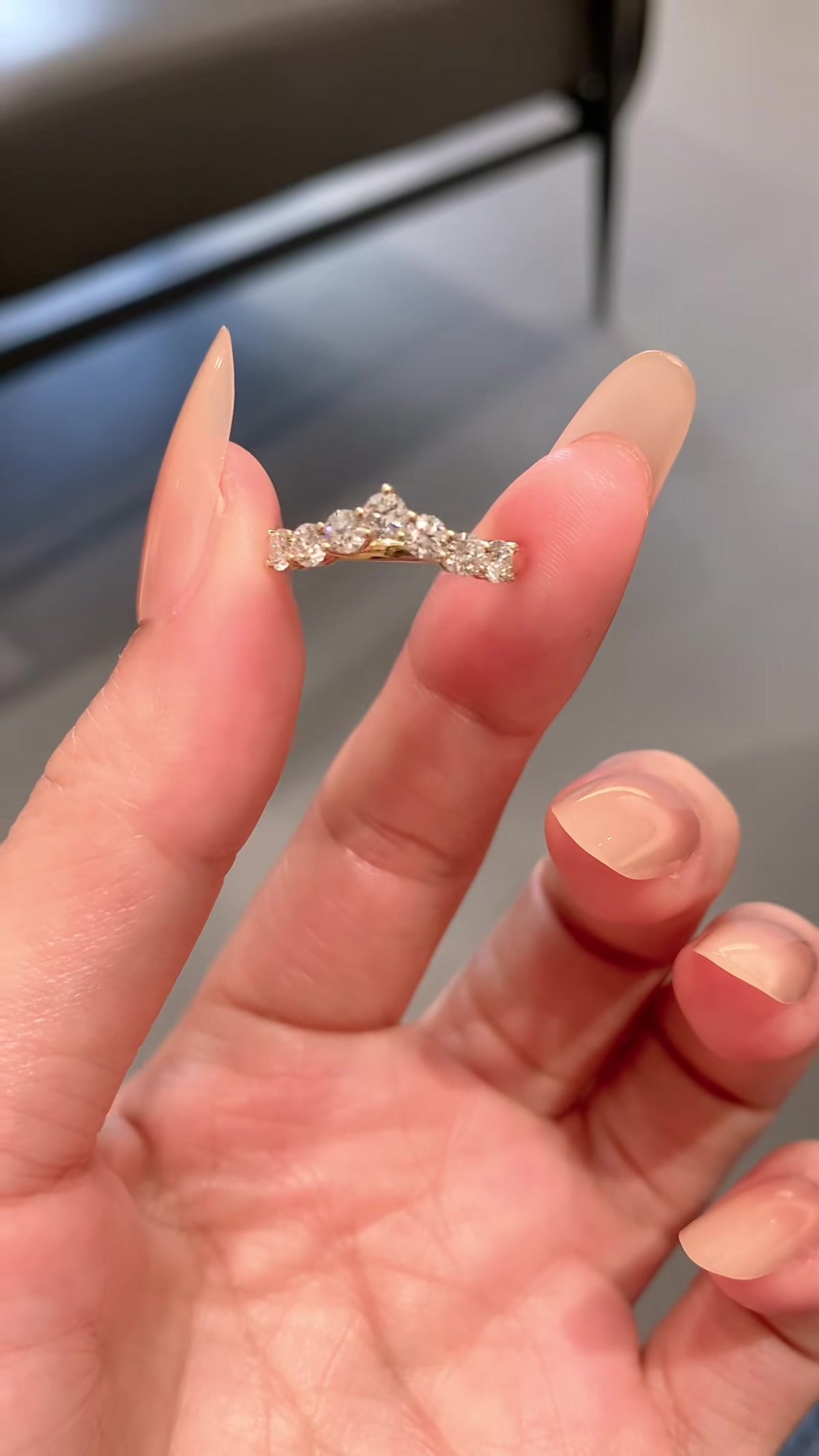 Close-up of lab-grown diamond chevron stacking ring for wedding bands