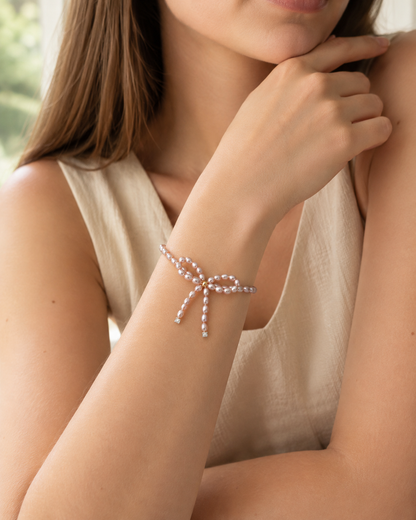 Rosa Perlenarmband Damen mit Süßwasserperlen & Schleifenmotiv