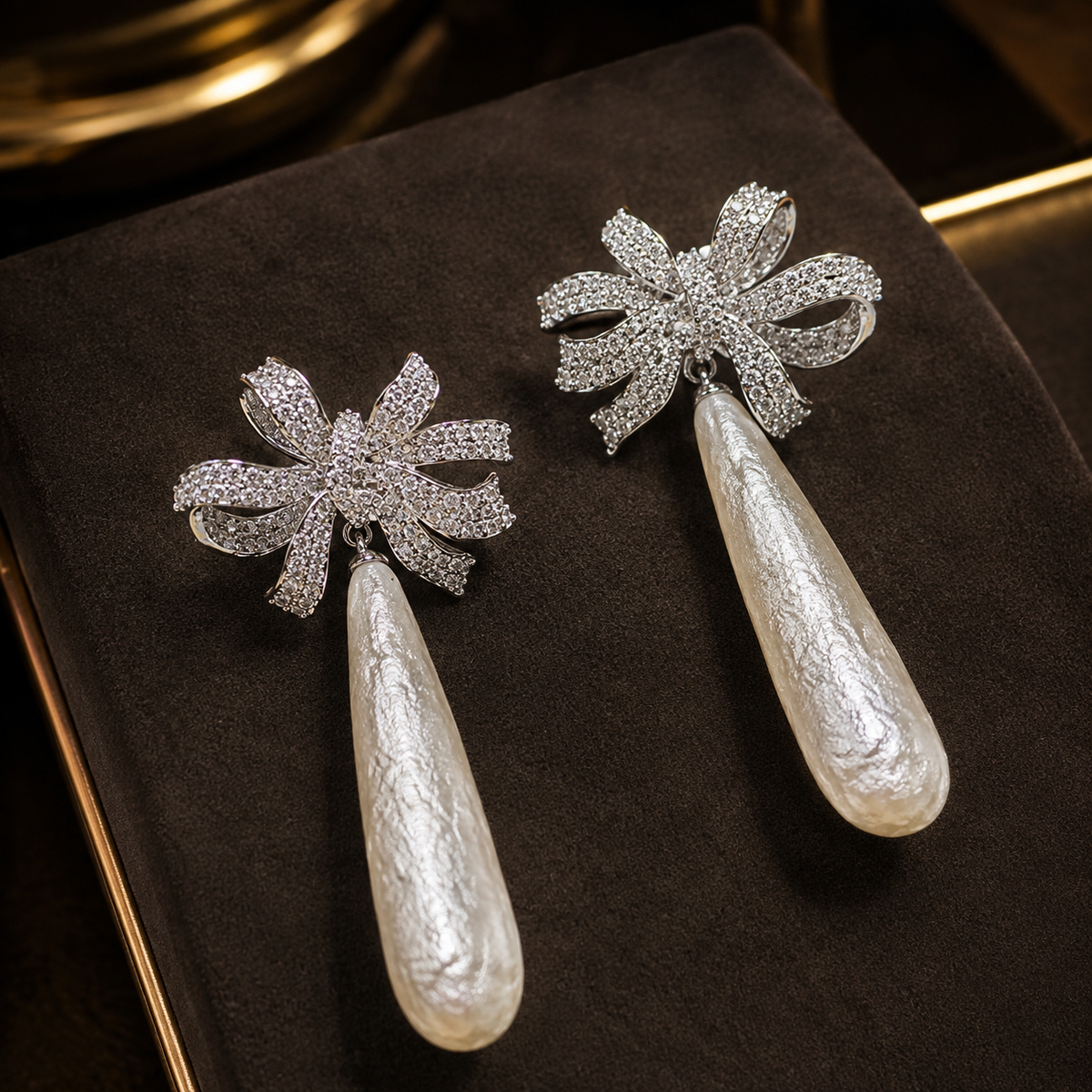 Elongated Baroque Pearl Bow Drop Earrings