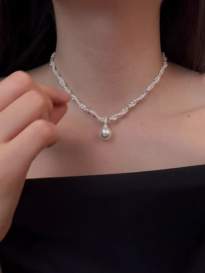Front view of layered silver-tone high-lustre freshwater pearl necklace for weddings