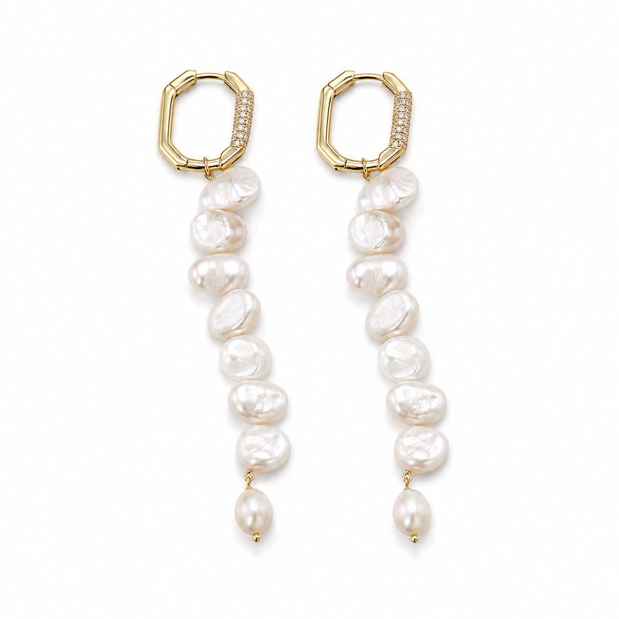 Pair of 14K gold baroque freshwater pearl cascade earrings on a white background