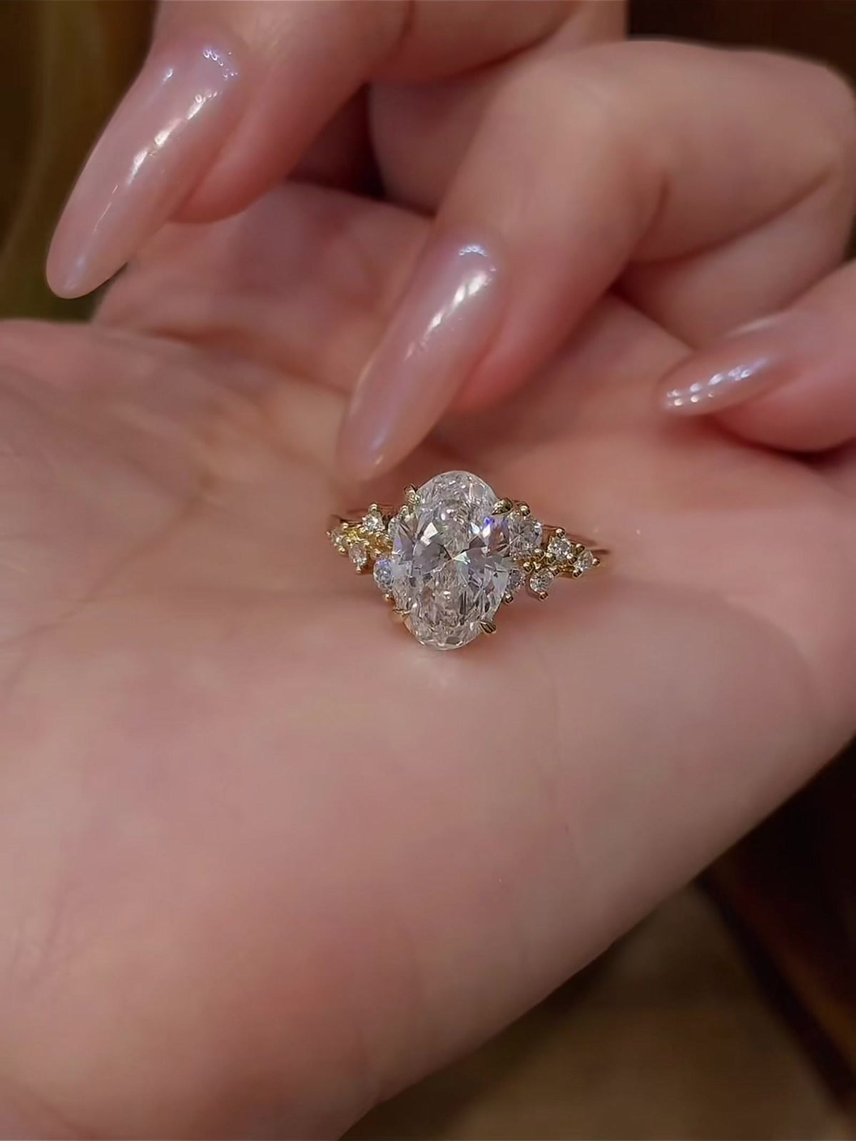 Styled view of lab-grown diamond oval romantic engagement ring for city proposals
