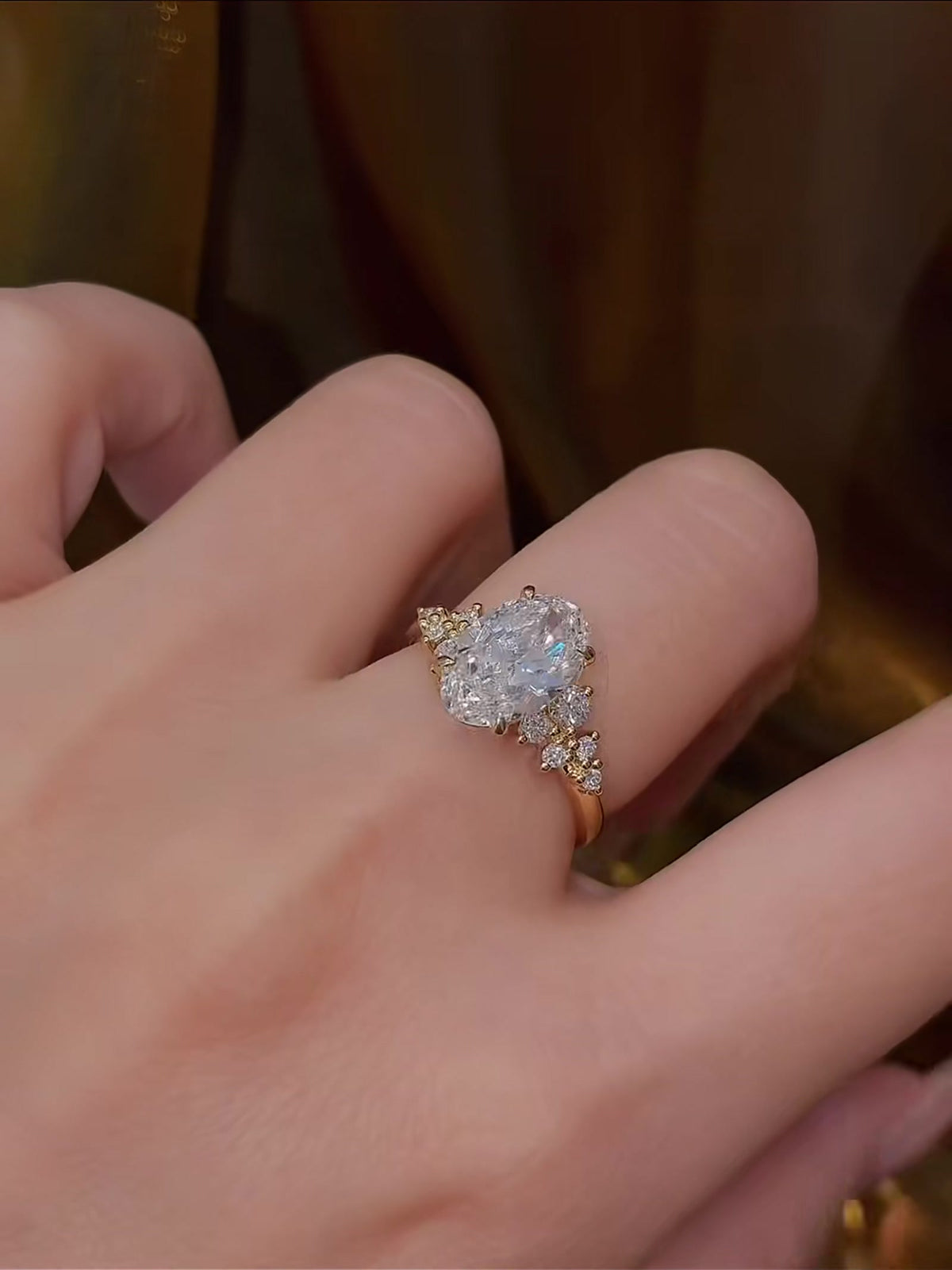 Close-up of lab-grown diamond oval romantic engagement ring for city proposals