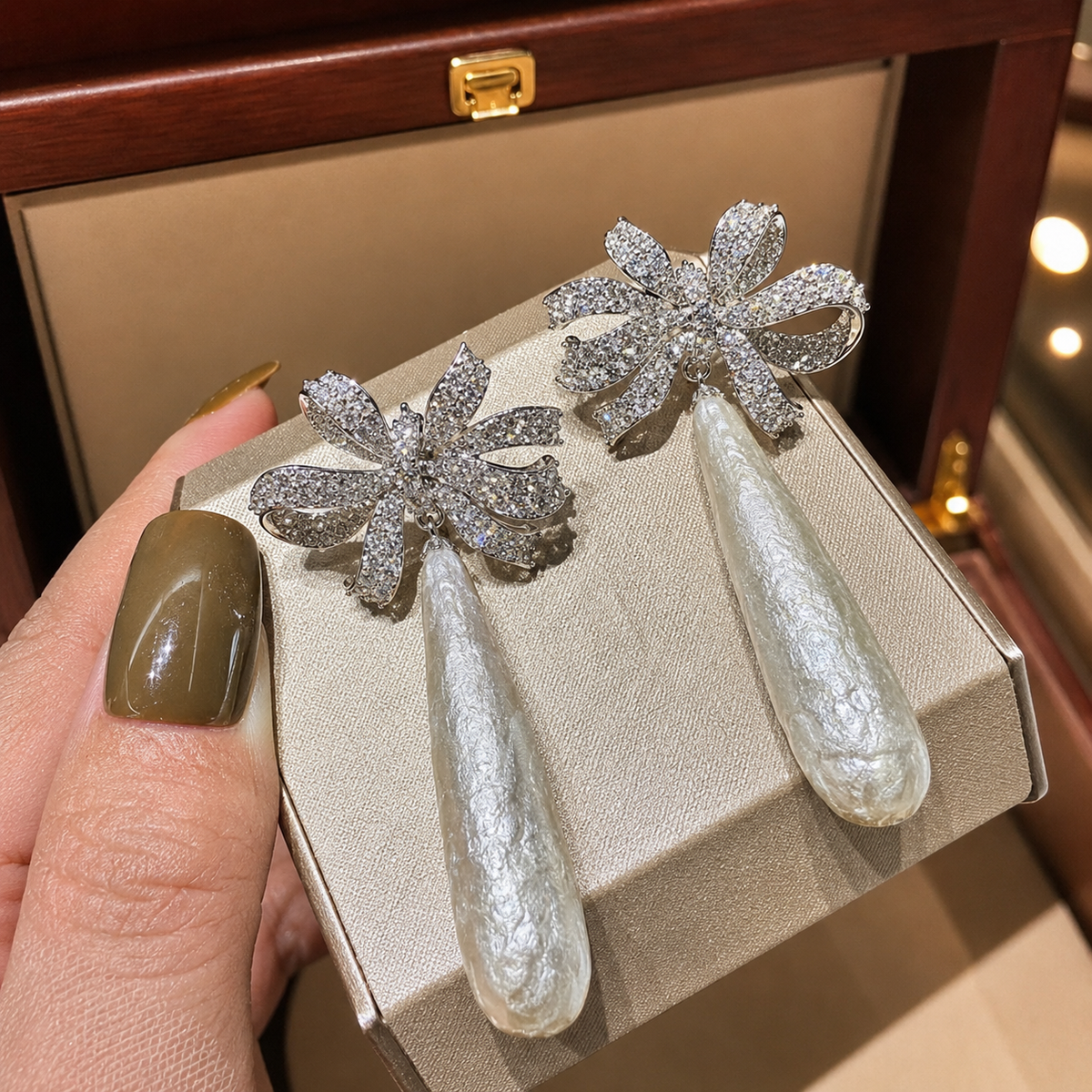 Elongated Baroque Pearl Bow Drop Earrings