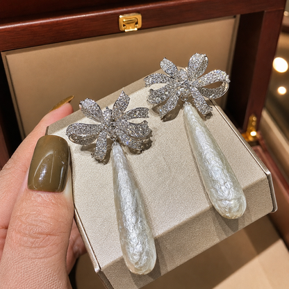 Elongated Baroque Pearl Bow Drop Earrings