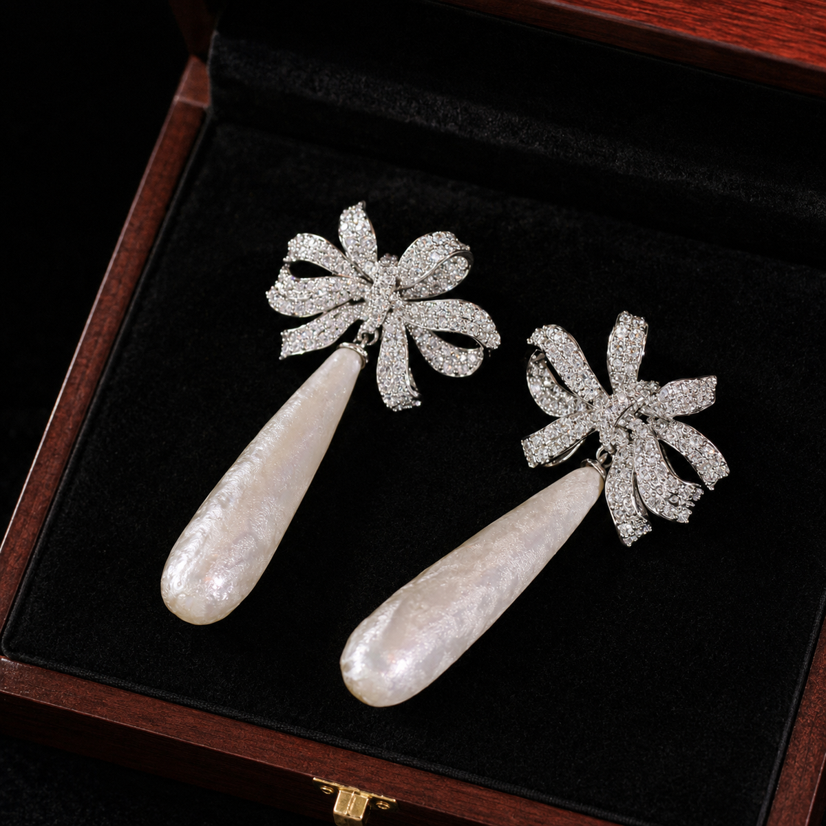 Elongated Baroque Pearl Bow Drop Earrings