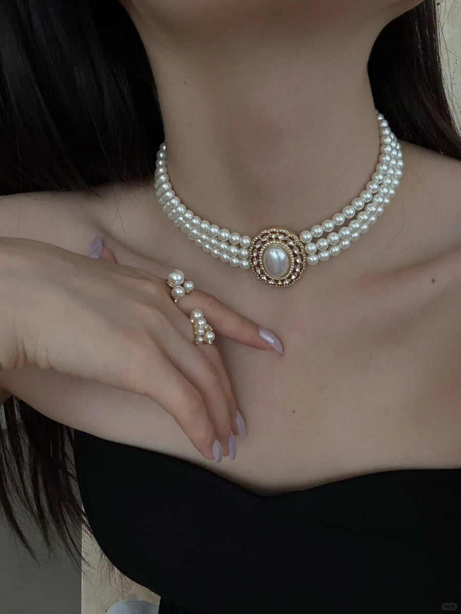 Styled view of multi-strand choker high-lustre freshwater pearl necklace for weddings