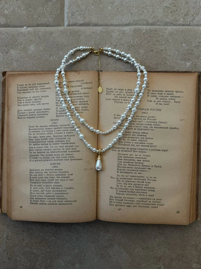 Front view of layered drop high-lustre freshwater pearl necklace for weddings