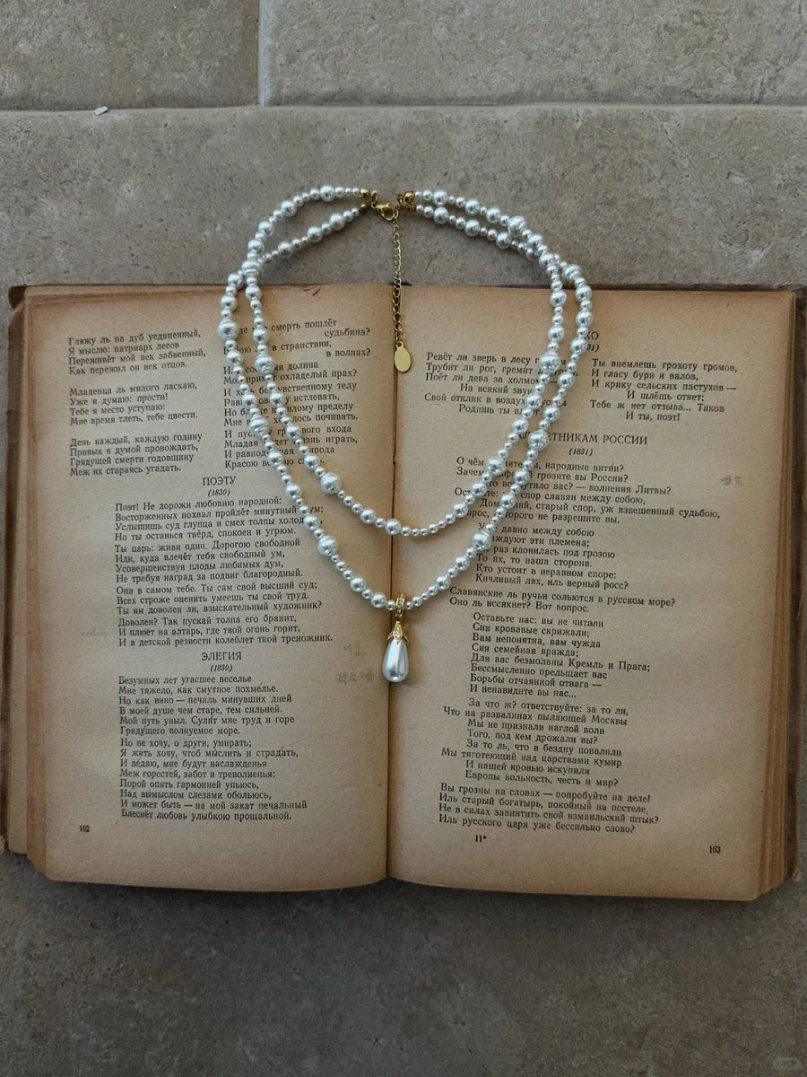 Front view of layered drop high-lustre freshwater pearl necklace for weddings