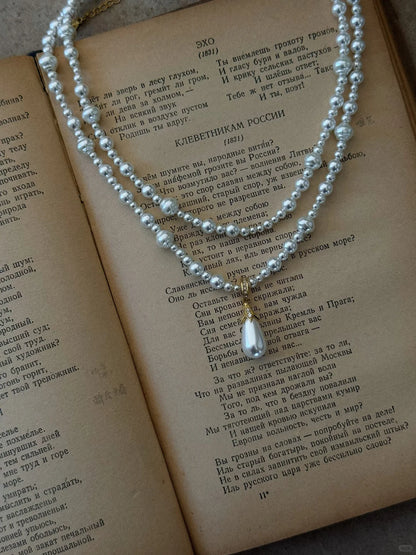 Close-up of layered drop high-lustre freshwater pearl necklace for weddings