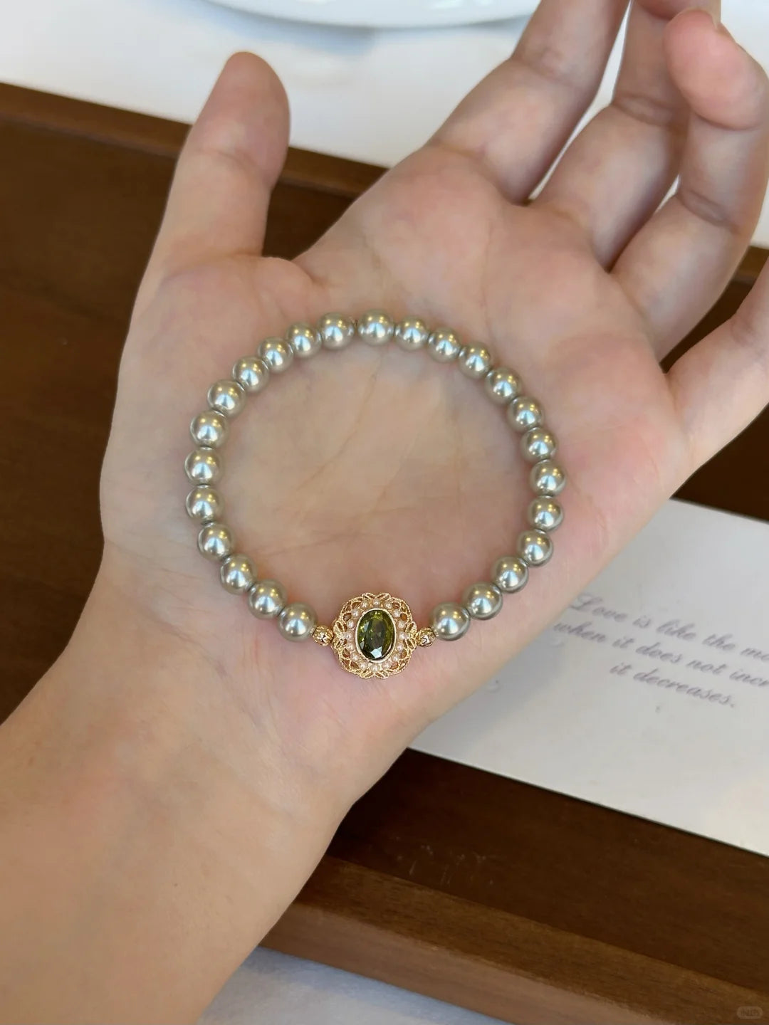 Front view of circle motif high-lustre freshwater pearl bracelet for bridal styling