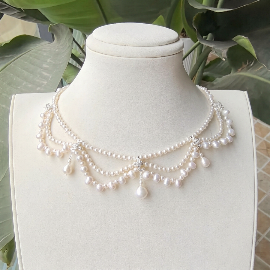 Front view of Celeste Layered Pearl Necklace, a natural freshwater pearl necklace for wedding guest looks