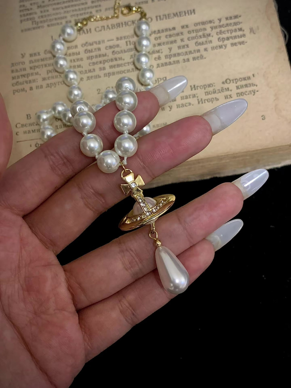 Front view of orb motif high-lustre freshwater pearl necklace for weddings