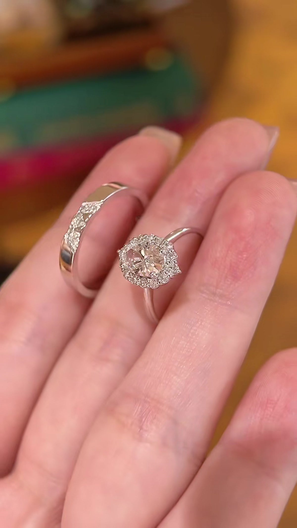 Close-up of lab-grown diamond oval halo wedding ring for engagement proposals