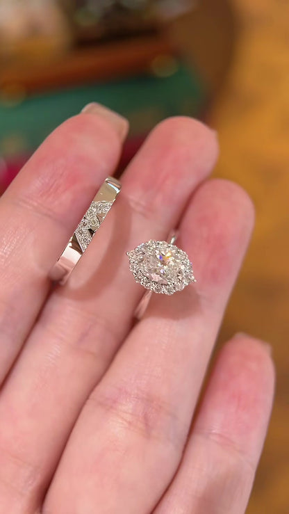 Styled view of lab-grown diamond oval halo wedding ring for engagement proposals