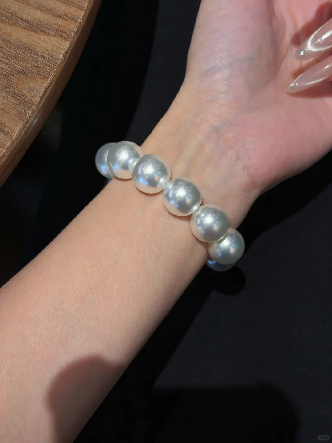 Close-up of classic strand high-lustre freshwater pearl bracelet for bridal styling