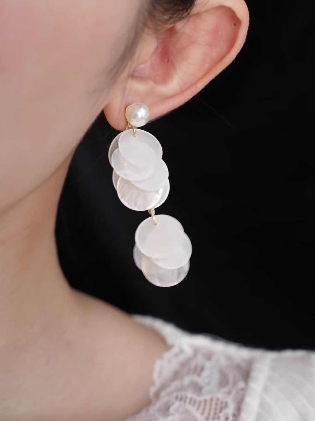 Front view of white shell drop high-lustre freshwater pearl earrings for wedding guest looks