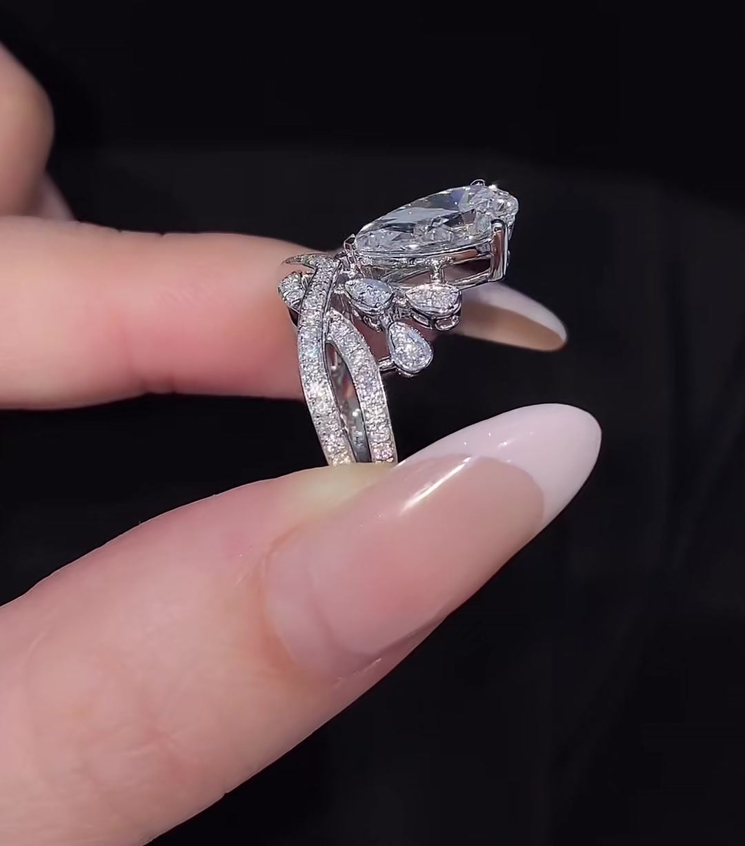 Styled view of lab-grown diamond pear crown engagement ring for fairytale proposals