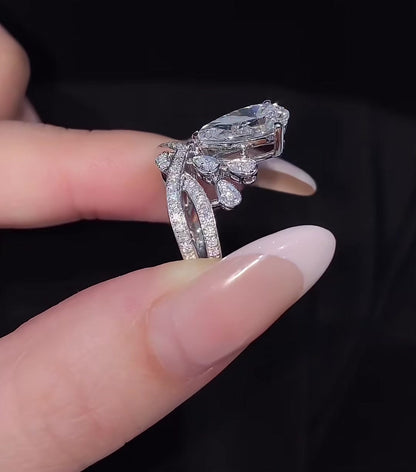 Styled view of lab-grown diamond pear crown engagement ring for fairytale proposals
