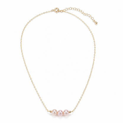 Zartes Perlenarmband Damen mit rosa-lila Süßwasserperlen – goldfarben