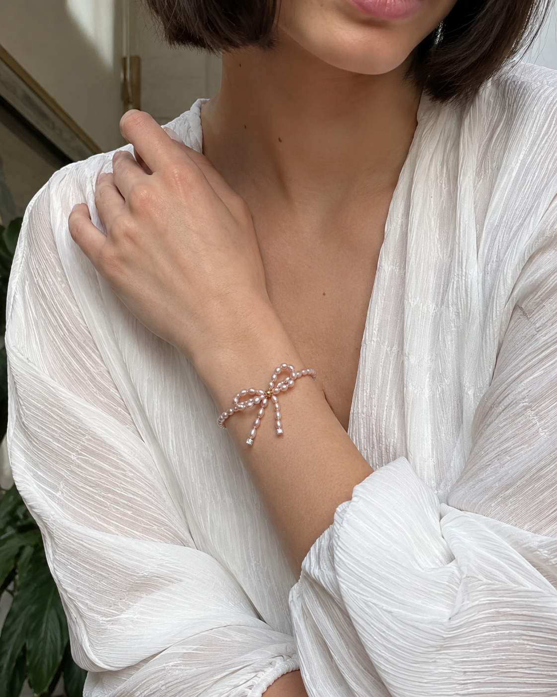 Rosa Perlenarmband Damen mit Süßwasserperlen & Schleifenmotiv