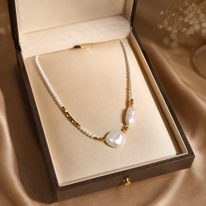 Baroque freshwater pearl necklace presented in a luxury jewellery box