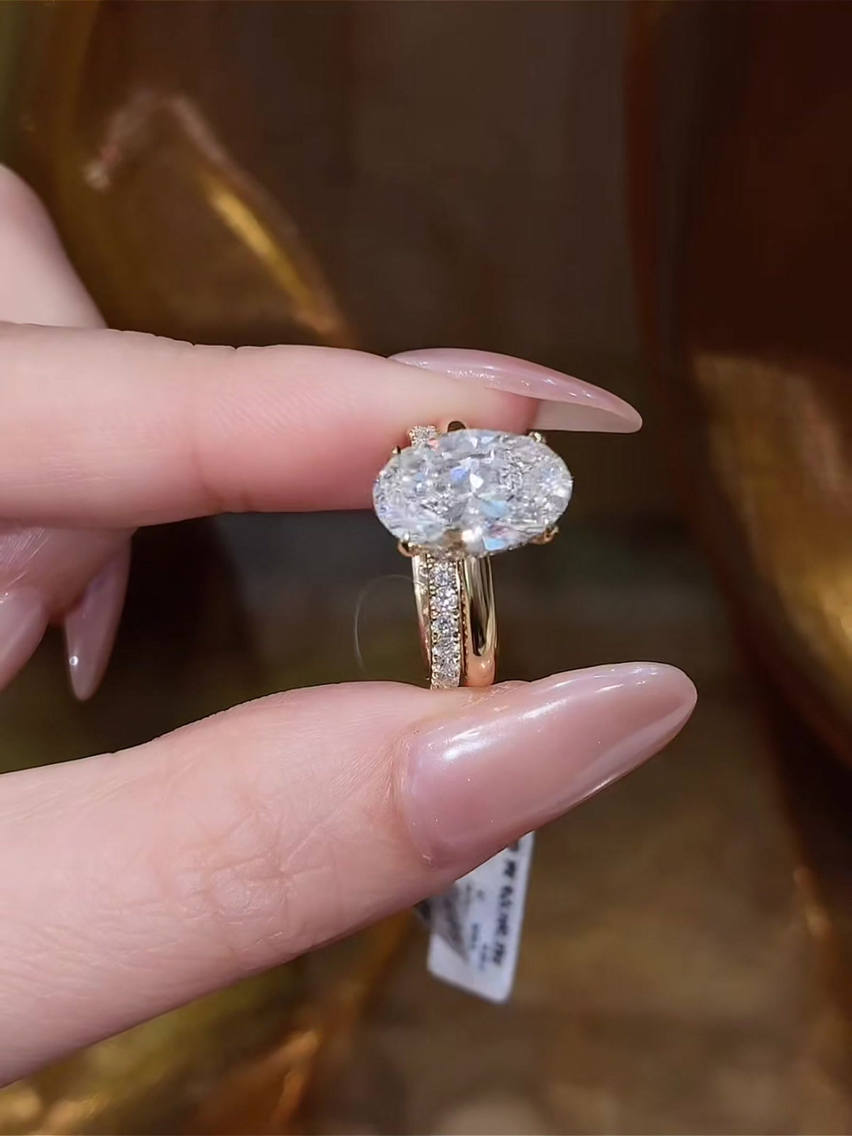 Styled view of lab-grown diamond oval stacking engagement ring for engagement proposals