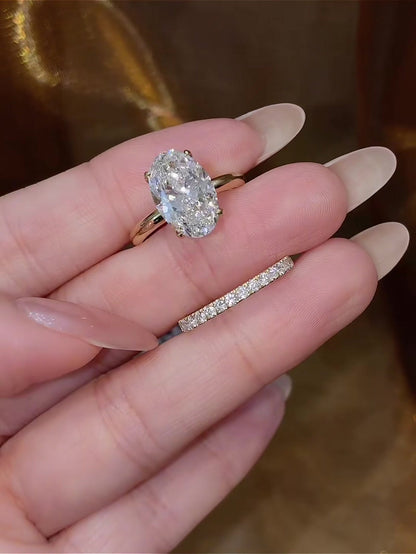 Close-up of lab-grown diamond oval stacking engagement ring for engagement proposals