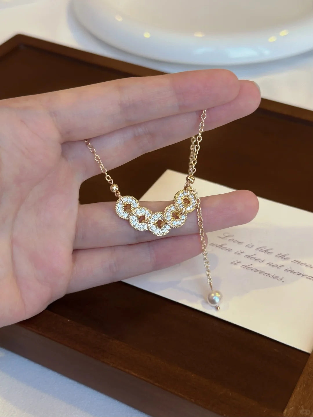 Styled view of y drop high-lustre freshwater pearl necklace for weddings