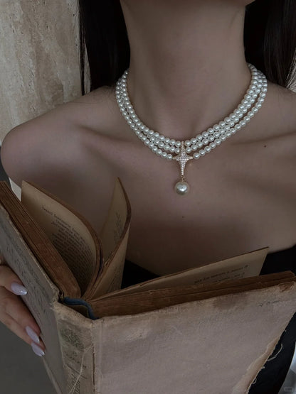 Detail view of multi-strand choker high-lustre freshwater pearl necklace for weddings