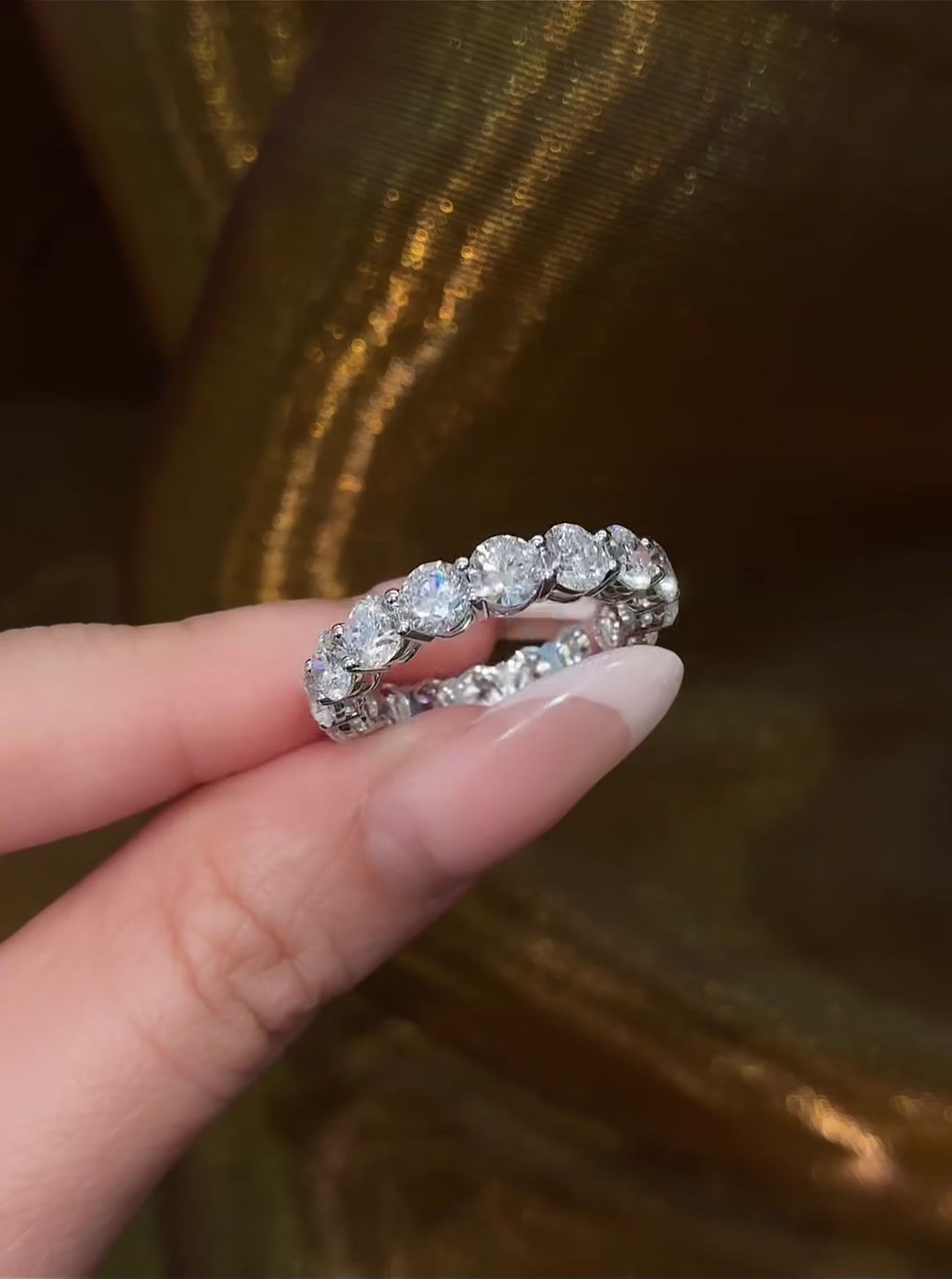 Front view of lab-grown diamond emerald cut full eternity ring for wedding bands