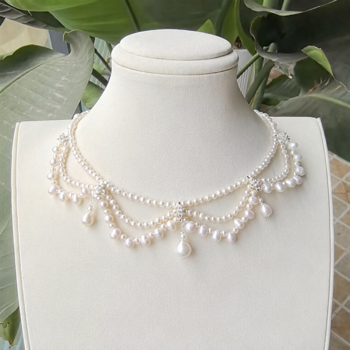 Front view of Étoile Draped Pearl Necklace, a natural freshwater pearl necklace for formal dinners