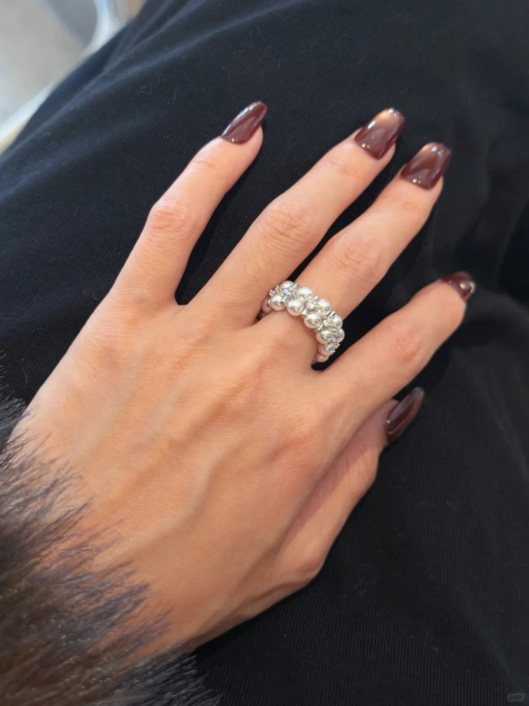 Front view of cluster high-lustre freshwater pearl ring for anniversary dinners