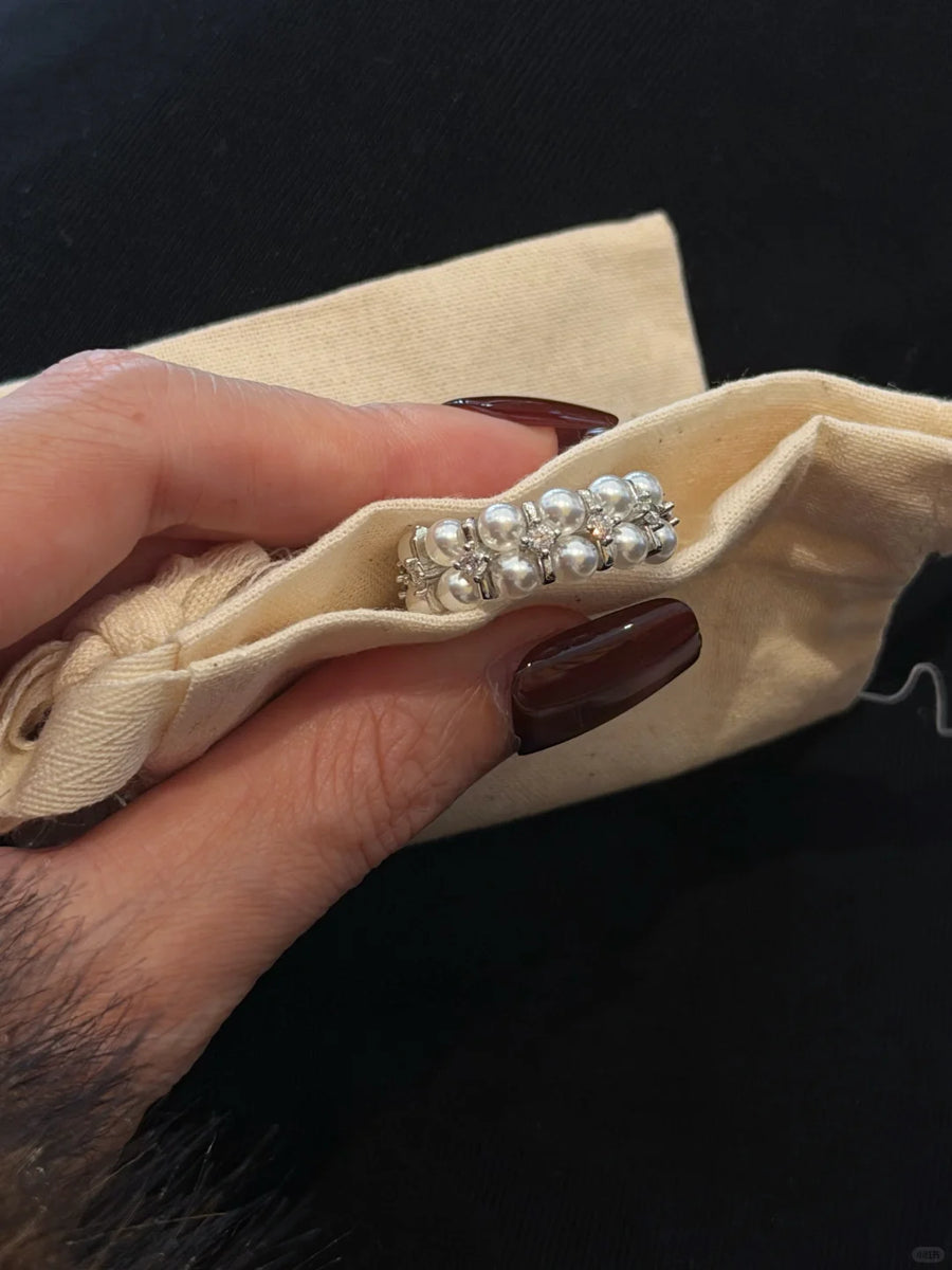 Styled view of cluster high-lustre freshwater pearl ring for anniversary dinners