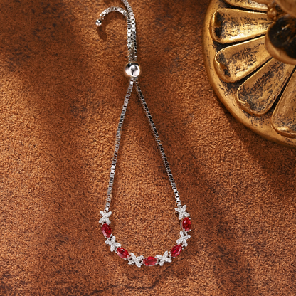 Styled view of lab-grown ruby floral bracelet in 16K gold for anniversary gifts