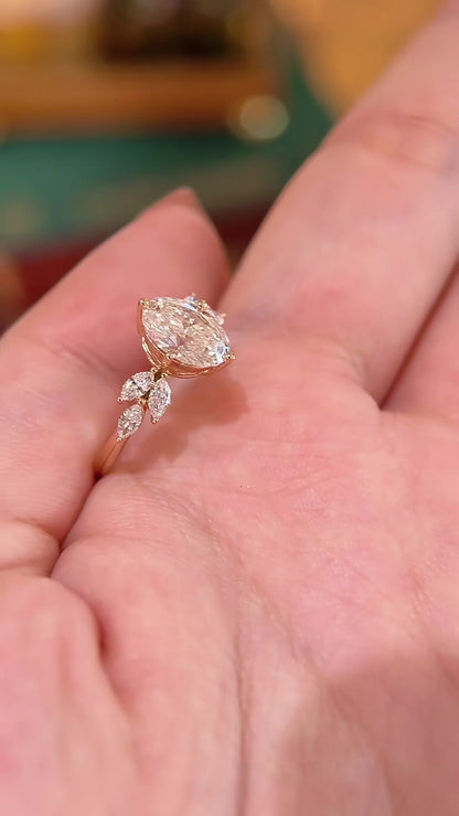 Close-up of lab-grown diamond floral bridal engagement ring for romantic proposals