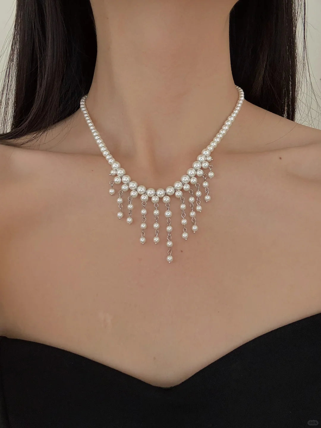 Styled view of statement drop high-lustre freshwater pearl necklace for weddings