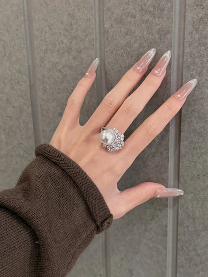 Front view of radiant statement high-lustre freshwater pearl ring for anniversary dinners