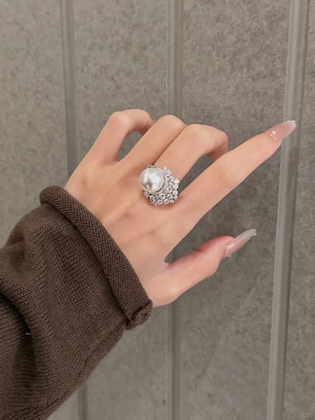 Styled view of radiant statement high-lustre freshwater pearl ring for anniversary dinners