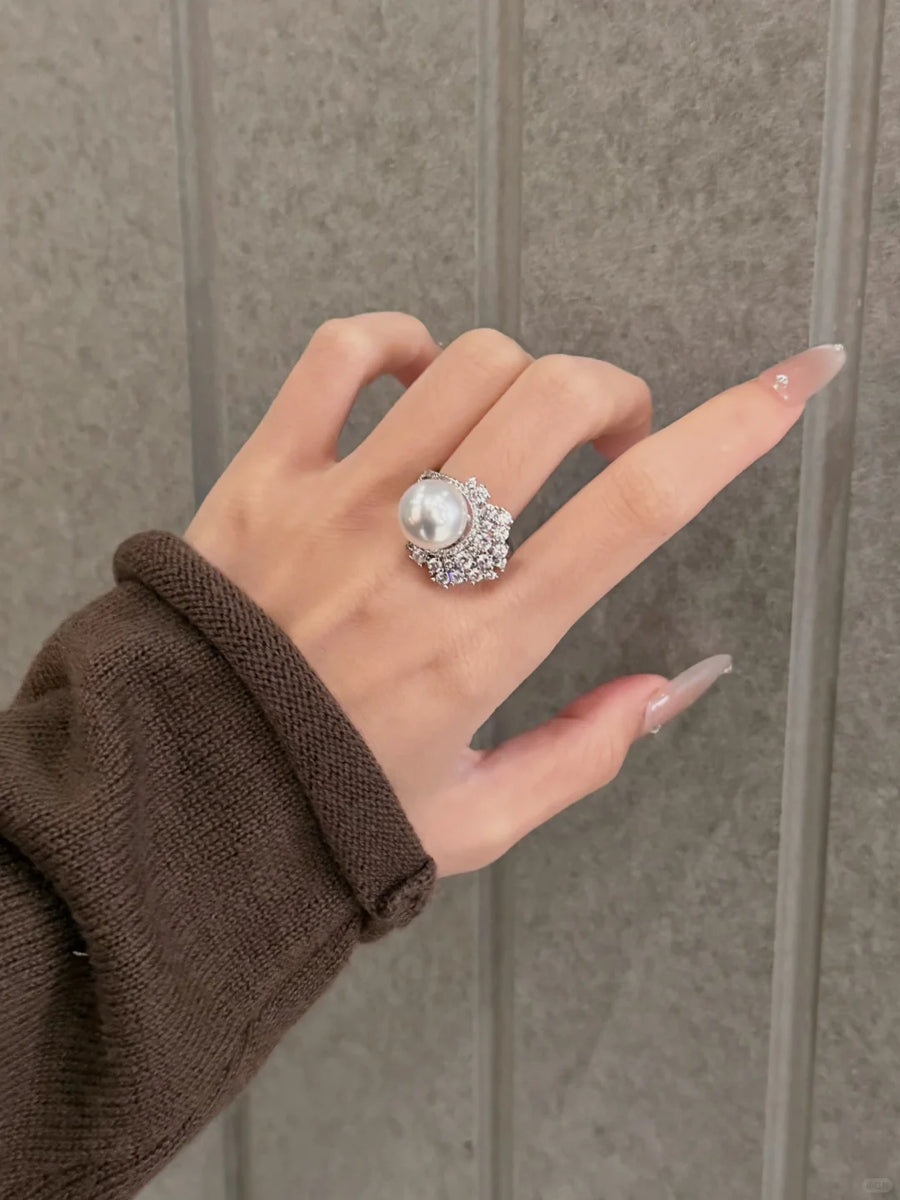 Styled view of radiant statement high-lustre freshwater pearl ring for anniversary dinners