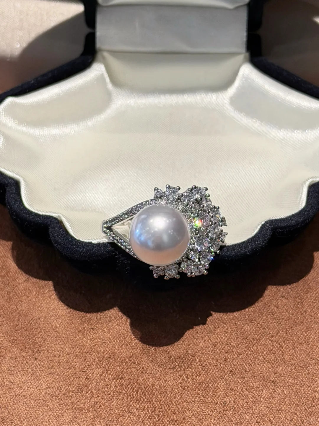 Close-up of radiant statement high-lustre freshwater pearl ring for anniversary dinners