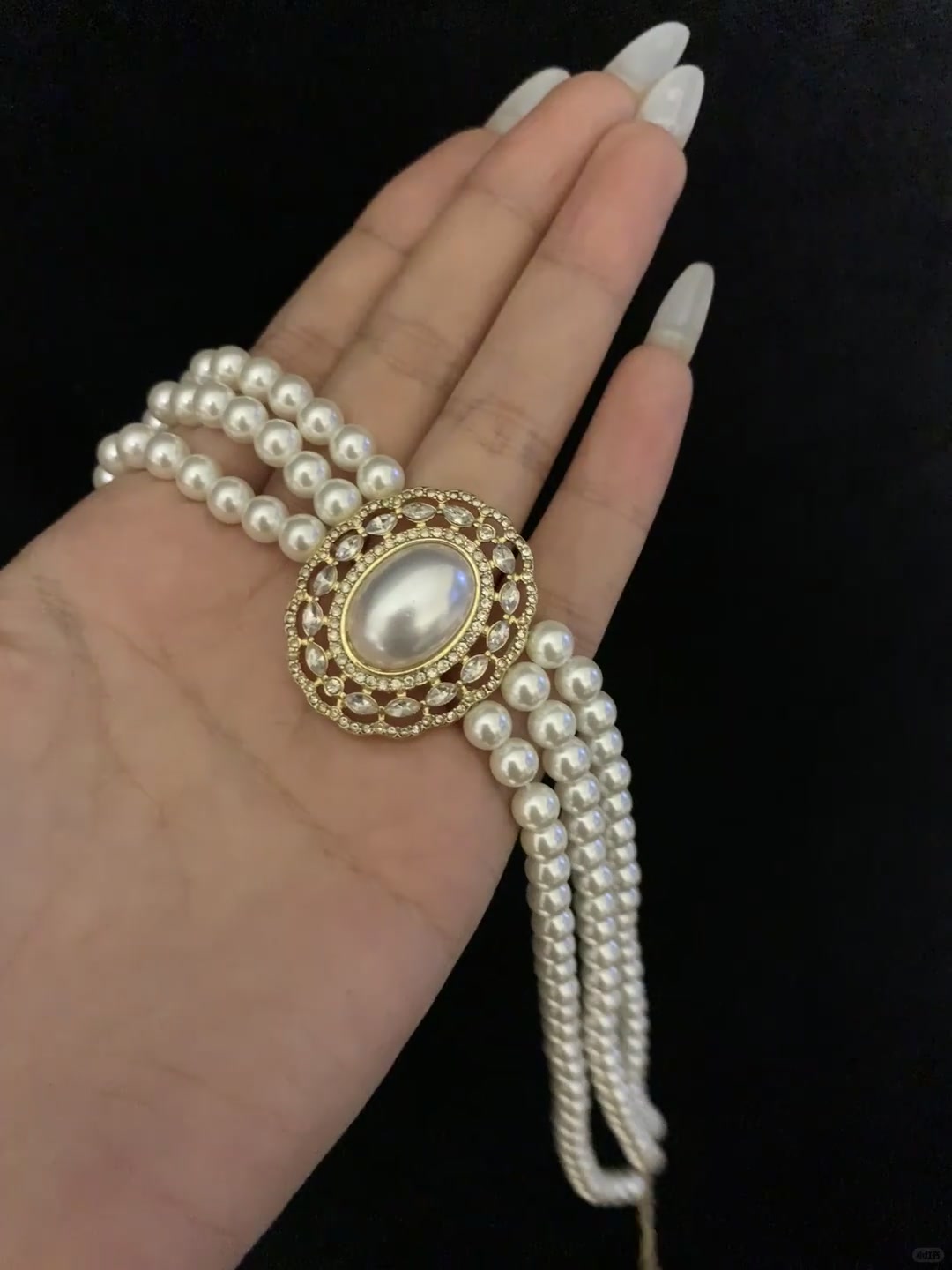 Front view of multi-strand high-lustre freshwater pearl bracelet for bridal styling