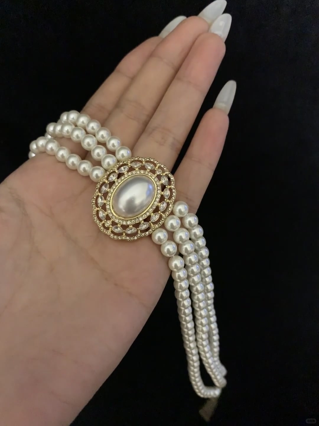 Styled view of multi-strand high-lustre freshwater pearl bracelet for bridal styling